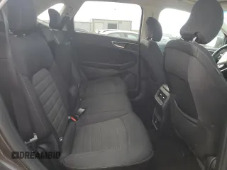 2019 Ford Edge SEL z VIN 2FMPK4J94KBB70789, wystawiony jako Copart lot #52565675 z przebiegiem 82 888 mil mil oraz Szkoda całkowita • Salvage title. Historia ofert i sprzedaży dostępna na DreamBid. Obrazek 11.