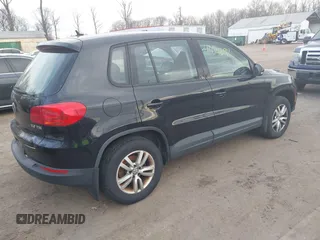 2013 Volkswagen Tiguan S with VIN WVGAV3AX4DW572884, listed as a IAAI auction lot 41626981 with 243,188 mi miles and . Bid and sale history available at DreamBid. Image 4.