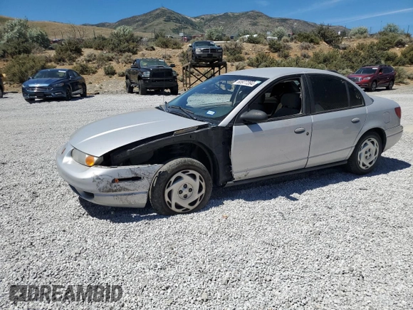 2001 Saturn SL with VIN 1G8ZK52731Z237050, listed as a Copart auction lot 60977394 with Not provided miles and Salvage title. Bid and sale history available at DreamBid. Image 1.