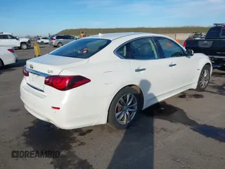 2016 Infiniti Q70 with VIN JN1EY1APXGM470039, listed as a IAAI auction lot 41331470 with 62,831 mi miles and . Bid and sale history available at DreamBid. Image 4.