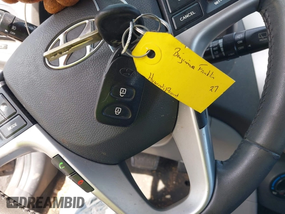 2012 Hyundai Accent SE with VIN KMHCU5AE8CU015055, listed as a IAAI auction lot 41814610 with 141,769 mi miles. Bid and sale history available at carsss.com. Image 11.