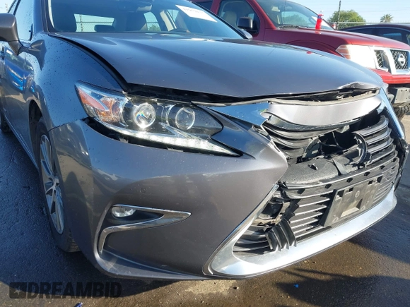 2016 Lexus ES 300h z VIN JTHBW1GG6G2108510, wystawiony jako IAAI lot #41959175 z przebiegiem 142 882 mil mil oraz . Historia ofert i sprzedaży dostępna na DreamBid. Obrazek 18.