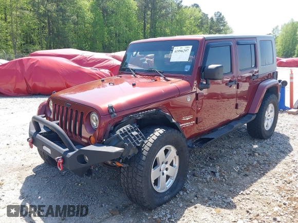 2007 Jeep Wrangler Unlimited Sahara with VIN 1J4GA59187L116585, listed as a IAAI auction lot 41996297 with 151,961 mi miles and . Bid and sale history available at DreamBid. Image 17.