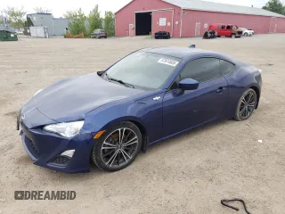 2016 Scion FR-S z VIN JF1ZNAA13G9701486, wystawiony jako Copart lot #57674605 z przebiegiem 146 967 mil mil oraz Czysty tytuł • Clean title. Historia ofert i sprzedaży dostępna na DreamBid. Obrazek 1.