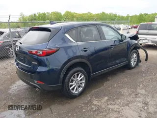 2023 Mazda CX-5 S Select with VIN JM3KFBBM5P0254047, listed as a IAAI auction lot 42069916 with 29,600 mi miles and . Bid and sale history available at carsss.com. Image 4.