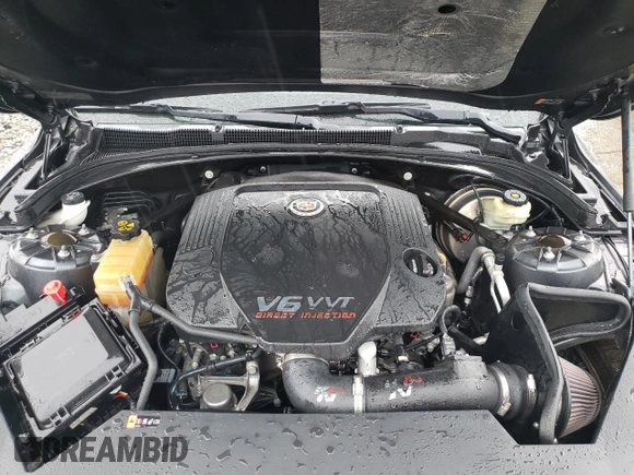 2013 Cadillac ATS Premium z VIN 1G6AE5S32D0119431, wystawiony jako Copart lot #65618324 z przebiegiem 158 233 mil mil oraz Nie do naprawy • Non repairable. Historia ofert i sprzedaży dostępna na DreamBid. Obrazek 11.
