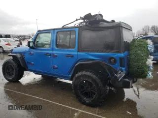 2023 Jeep Wrangler Sport S with VIN 1C4HJXDNXPW543376, listed as a Copart auction lot 86488024 with 35,935 mi miles and Salvage Title. Bid and sale history available at DreamBid. Image 2.