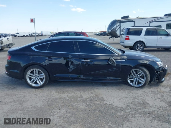 2019 Audi A5 Sportback Premium with VIN WAUANCF51KA061345, listed as a IAAI auction lot 41841741 with 84,732 mi miles. Bid and sale history available at carsss.com. Image 13.