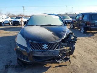 2010 Suzuki Kizashi SE with VIN JS2RE9A34A6100807, listed as a IAAI auction lot 41690974 with 122,419 mi miles and . Bid and sale history available at DreamBid. Image 6.