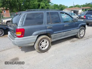 2002 Jeep Grand Cherokee Laredo with VIN 1J4GW48S92C150162, listed as a IAAI auction lot 42471732 with 171,677 mi miles and . Bid and sale history available at DreamBid. Image 4.