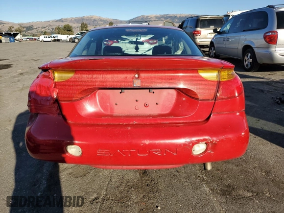 2001 Saturn SC z VIN 1G8ZY14741Z271020, wystawiony jako Copart lot #82922764 z przebiegiem Nie podano mil oraz Nie do naprawy. Historia ofert i sprzedaży dostępna na DreamBid. Obrazek 6.