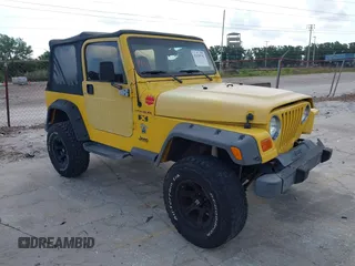 2002 Jeep Wrangler X z VIN 1J4FA39S82P719241, wystawiony jako IAAI lot #42150742 z przebiegiem 147 914 mil mil oraz . Historia ofert i sprzedaży dostępna na DreamBid. Obrazek 1.