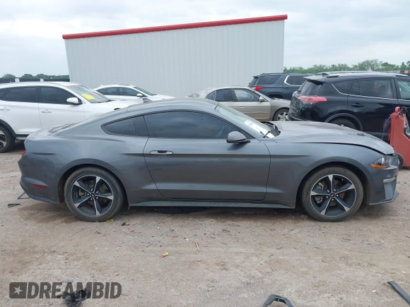 2021 Ford Mustang EcoBoost with VIN 1FA6P8TH1M5152941, listed as a IAAI auction lot 42110646 with 26,673 mi miles and . Bid and sale history available at DreamBid. Image 13.