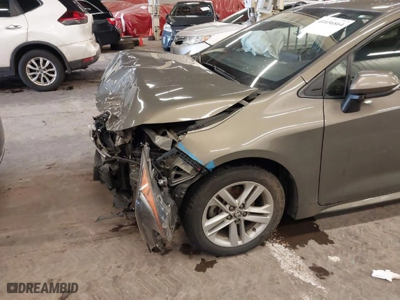 2019 Toyota Corolla Hatchback SE with VIN JTNK4RBE1K3011063, listed as a IAAI auction lot 41656864 with 104,102 mi miles. Bid and sale history available at carsss.com. Image 6.
