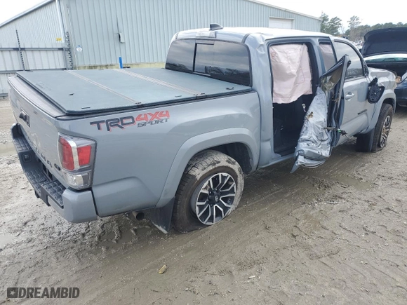 2021 Toyota Tacoma 4WD SR with VIN 3TMCZ5AN5MM385102, listed as a Copart auction lot 49399545 with 65,979 mi miles and Salvage Title. Bid and sale history available at carsss.com. Image 3.