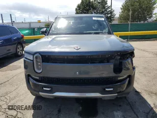 2023 Rivian R1T Adventure z VIN 7FCTGAAA4PN021950, wystawiony jako Copart lot #57800485 z przebiegiem 2 480 mil mil oraz Szkoda całkowita • Salvage title. Historia ofert i sprzedaży dostępna na DreamBid. Obrazek 5.
