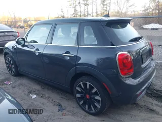 2016 MINI Cooper Hardtop 4 Door S with VIN WMWXU3C56G2B63682, listed as a IAAI auction lot 41244676 with 110,902 mi miles. Bid and sale history available at carsss.com. Image 15.