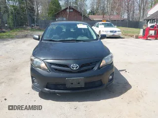 2012 Toyota Corolla L with VIN 2T1BU4EE4CC886407, listed as a IAAI auction lot 42142996 with 216,543 mi miles. Bid and sale history available at carsss.com. Image 12.
