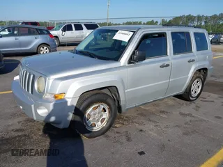 2009 Jeep Patriot Sport with VIN 1J4FT28B99D121838, listed as a IAAI auction lot 42000092 with 218,483 mi miles. Bid and sale history available at carsss.com. Image 2.