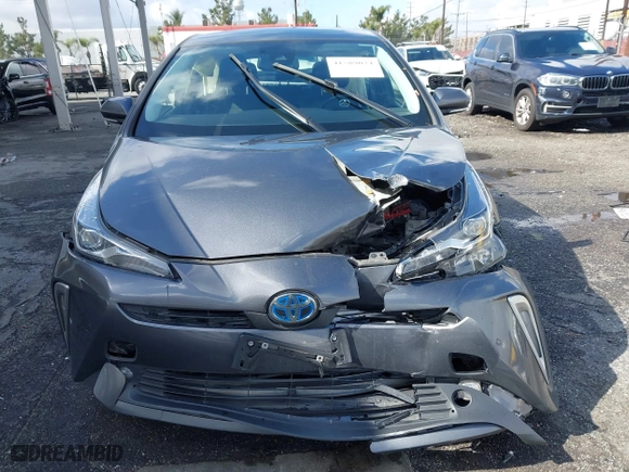 2022 Toyota Prius L Eco with VIN JTDKAMFU7N3155268, listed as a IAAI auction lot 41589024 with 158,430 mi miles. Bid and sale history available at carsss.com. Image 6.