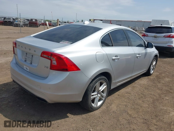 2015 Volvo S60 T5 Drive-E Premier with VIN YV140MFK5F1344597, listed as a IAAI auction lot 41822415 with 103,301 mi miles and . Bid and sale history available at DreamBid. Image 4.