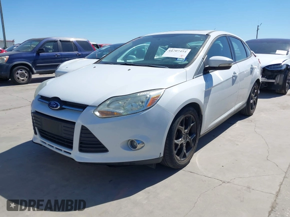 2013 Ford Focus SE with VIN 1FADP3F23DL345170, listed as a IAAI auction lot 41707454 with 140,334 mi miles and . Bid and sale history available at DreamBid. Image 2.