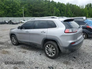 2019 Jeep Cherokee Latitude Plus with VIN 1C4PJLLB8KD176302, listed as a Copart auction lot 58181595 with 175,661 mi miles and Salvage title. Bid and sale history available at DreamBid. Image 2.