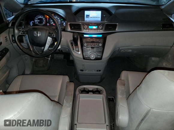 2012 Honda Odyssey Touring with VIN 5FNRL5H94CB026539, listed as a Copart auction lot 48925605 with 88,381 mi miles and Salvage Title. Bid and sale history available at DreamBid. Image 8.