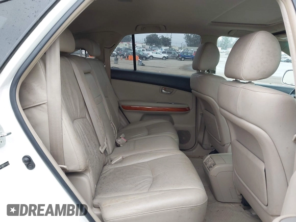 2007 Lexus RX 400h with VIN JTJGW31UX72001443, listed as a IAAI auction lot 42174586 with 191,431 mi miles and . Bid and sale history available at DreamBid. Image 8.