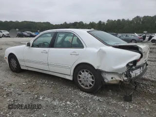 2000 Mercedes-Benz E-Class with VIN WDBJF70J1YB078418, listed as a Copart auction lot 71177244 with 189,838 mi miles and Salvage Title. Bid and sale history available at carsss.com. Image 2.