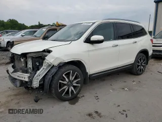 2019 Honda Pilot Touring 7-Passenger with VIN 5FNYF6H67KB005312, listed as a Copart auction lot 58785895 with 138,937 mi miles and Salvage title. Bid and sale history available at DreamBid. Image 1.