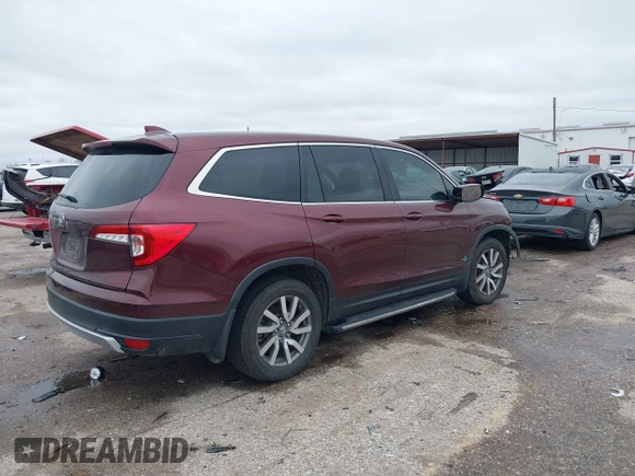 2019 Honda Pilot EX-L with VIN 5FNYF5H59KB026597, listed as a IAAI auction lot 41574993 with 67,750 mi miles. Bid and sale history available at carsss.com. Image 4.