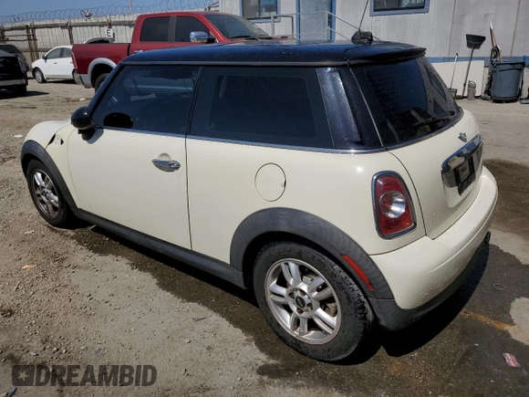 2013 MINI Hardtop with VIN WMWSU3C52DT680782, listed as a Copart auction lot 61779515 with 94,378 mi miles and Salvage title. Bid and sale history available at DreamBid. Image 2.