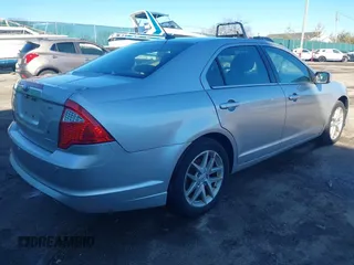 2012 Ford Fusion SEL with VIN 3FAHP0JG3CR124106, listed as a IAAI auction lot 41731000 with 156,515 mi miles. Bid and sale history available at carsss.com. Image 4.