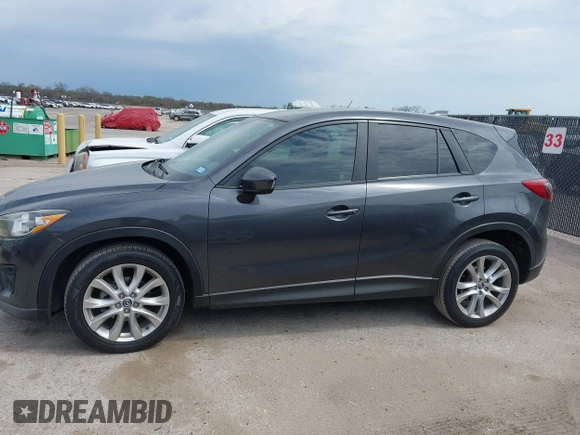 2014 Mazda CX-5 Grand Touring with VIN JM3KE2DY0E0354220, listed as a IAAI auction lot 41885502 with 168,901 mi miles. Bid and sale history available at carsss.com. Image 14.