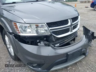 2013 Dodge Journey SXT with VIN 3C4PDCBG8DT517733, listed as a IAAI auction lot 42737063 with 67,363 mi miles and . Bid and sale history available at DreamBid. Image 13.