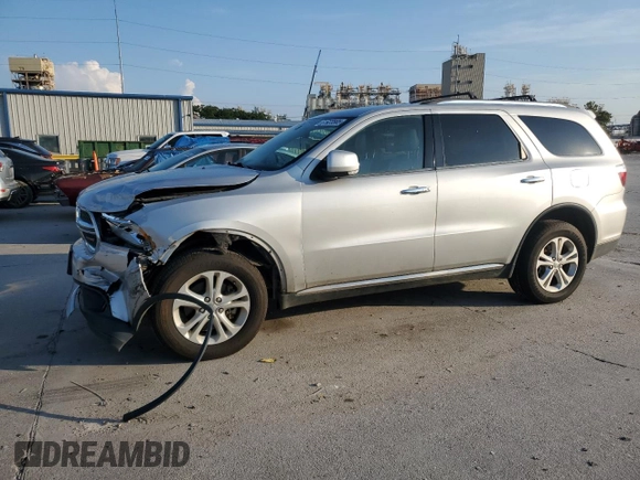 2013 Dodge Durango Crew with VIN 1C4RDHDG1DC616909, listed as a Copart auction lot 61923565 with 98,264 mi miles and Salvage title. Bid and sale history available at DreamBid. Image 1.