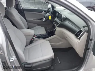 2020 Hyundai Tucson Value with VIN KM8J3CA43LU090462, listed as a IAAI auction lot 41456401 with 66,895 mi miles. Bid and sale history available at carsss.com. Image 5.