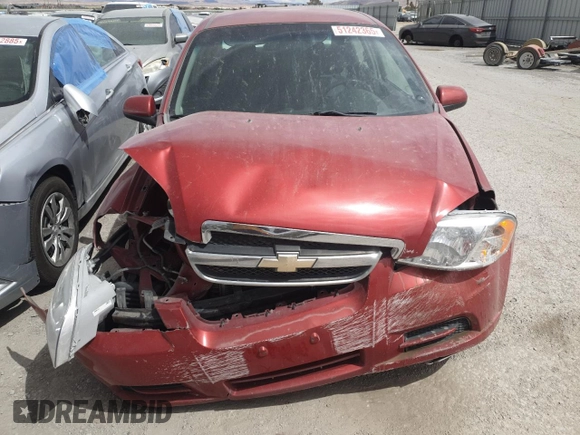 2007 Chevrolet Aveo LS z VIN KL1TD56627B175107, wystawiony jako Copart lot #51242365 z przebiegiem Nie podano mil oraz Szkoda całkowita • Salvage title. Historia ofert i sprzedaży dostępna na DreamBid. Obrazek 5.