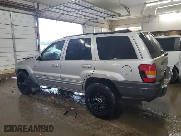 2002 Jeep Grand Cherokee Limited z VIN 1J8GW58S02C279251, wystawiony jako Copart lot #61563465 z przebiegiem 182 244 mil mil oraz Szkoda całkowita • Salvage title. Historia ofert i sprzedaży dostępna na DreamBid. Obrazek 2.