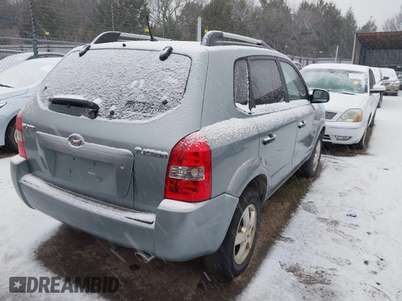 2007 Hyundai Tucson GLS with VIN KM8JM12B87U564202, listed as a IAAI auction lot 41277397 with 199,055 mi miles. Bid and sale history available at carsss.com. Image 4.