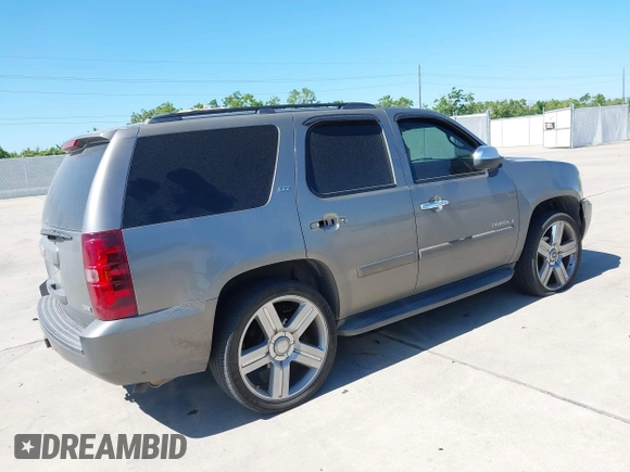 2008 Chevrolet Tahoe 3LT with VIN 1GNFC13018R154833, listed as a IAAI auction lot 42232738 with 243,993 mi miles and . Bid and sale history available at DreamBid. Image 4.