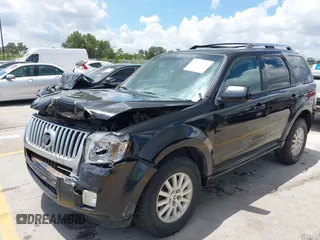 2011 Mercury Mariner Premier with VIN 4M2CN8HGXBKJ07489, listed as a IAAI auction lot 42574942 with 163,786 mi miles and . Bid and sale history available at DreamBid. Image 2.