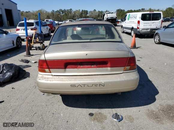 1999 Saturn SL with VIN 1G8ZK527XXZ111390, listed as a Copart auction lot 49042185 with 164,733 mi miles and Salvage Title. Bid and sale history available at carsss.com. Image 6.