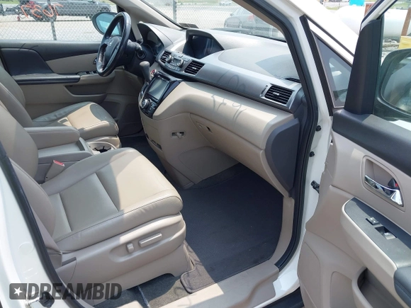 2014 Honda Odyssey EX-L with VIN 5FNRL5H62EB109573, listed as a IAAI auction lot 42387637 with 208,061 mi miles and . Bid and sale history available at DreamBid. Image 5.