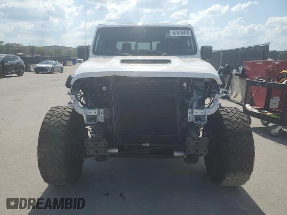 2023 Jeep Gladiator Mojave z VIN 1C6JJTEG7PL503422, wystawiony jako Copart lot #57415415 z przebiegiem 29 771 mil mil oraz Szkoda całkowita • Salvage title. Historia ofert i sprzedaży dostępna na DreamBid. Obrazek 5.