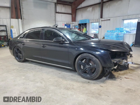 2013 Audi A8 4.0L z VIN WAUR2AFD5DN017108, wystawiony jako Copart lot #56350095 z przebiegiem 143 033 mil mil oraz Nie do naprawy • Non repairable. Historia ofert i sprzedaży dostępna na DreamBid. Obrazek 4.