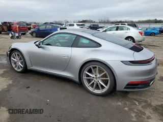 2022 Porsche 911 Carrera with VIN WP0AA2A98NS205474, listed as a Copart auction lot 40023494 with 9,889 mi miles. Bid and sale history available at carsss.com. Image 2.