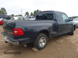 1999 Ford F-150 with VIN 1FTRX07W3XKC24438, listed as a IAAI auction lot 41634802 with Not provided miles and . Bid and sale history available at DreamBid. Image 4.
