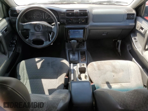 1999 Honda Passport LX with VIN 4S6CK58W7X4425704, listed as a Copart auction lot 67668404 with 207,409 mi miles and Salvage Title. Bid and sale history available at carsss.com. Image 8.